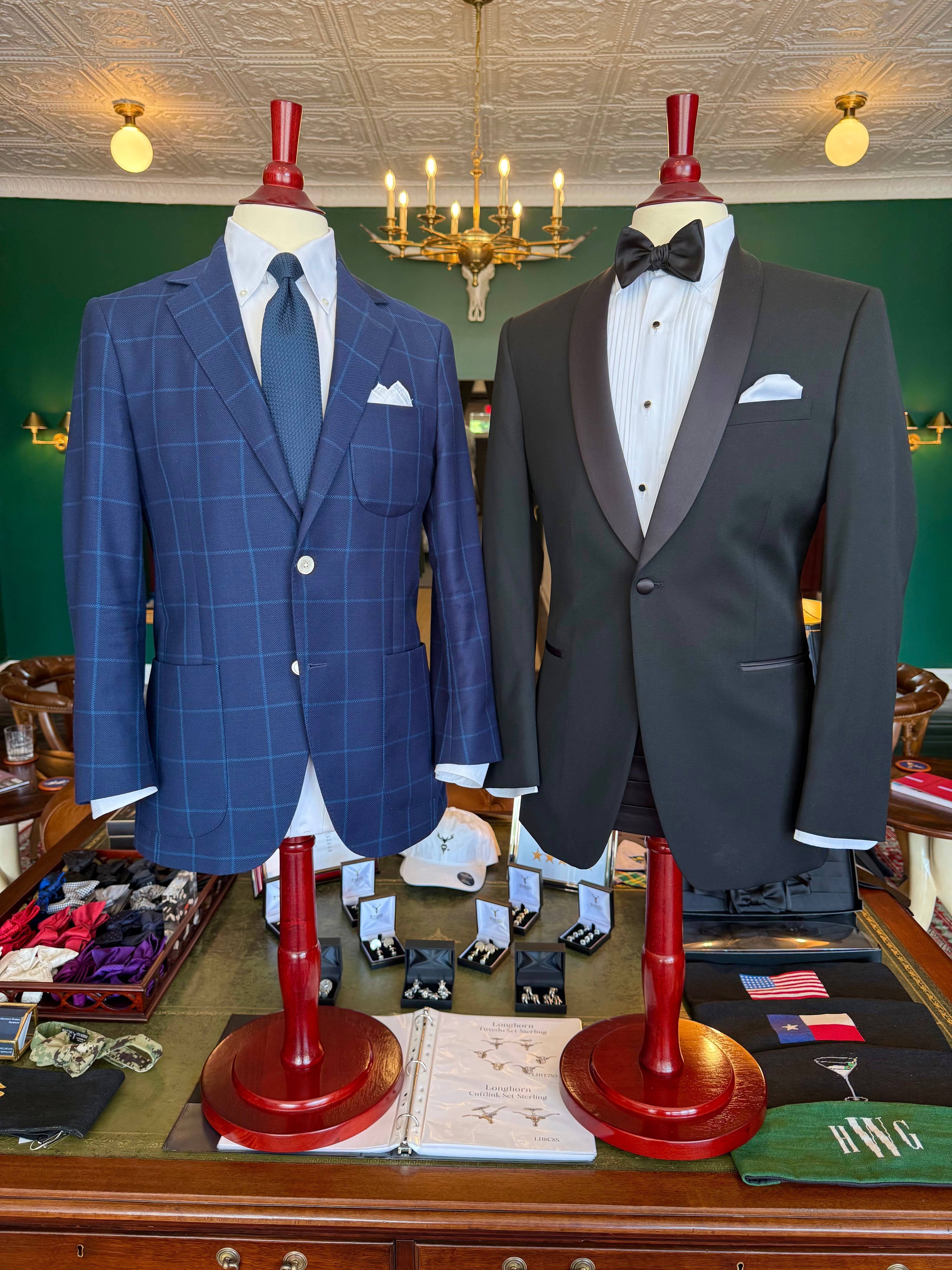 Blue windowpane sport coat and black satin shawl lapel on mahogany mannequins in Waring Tuxedos Fort Worth