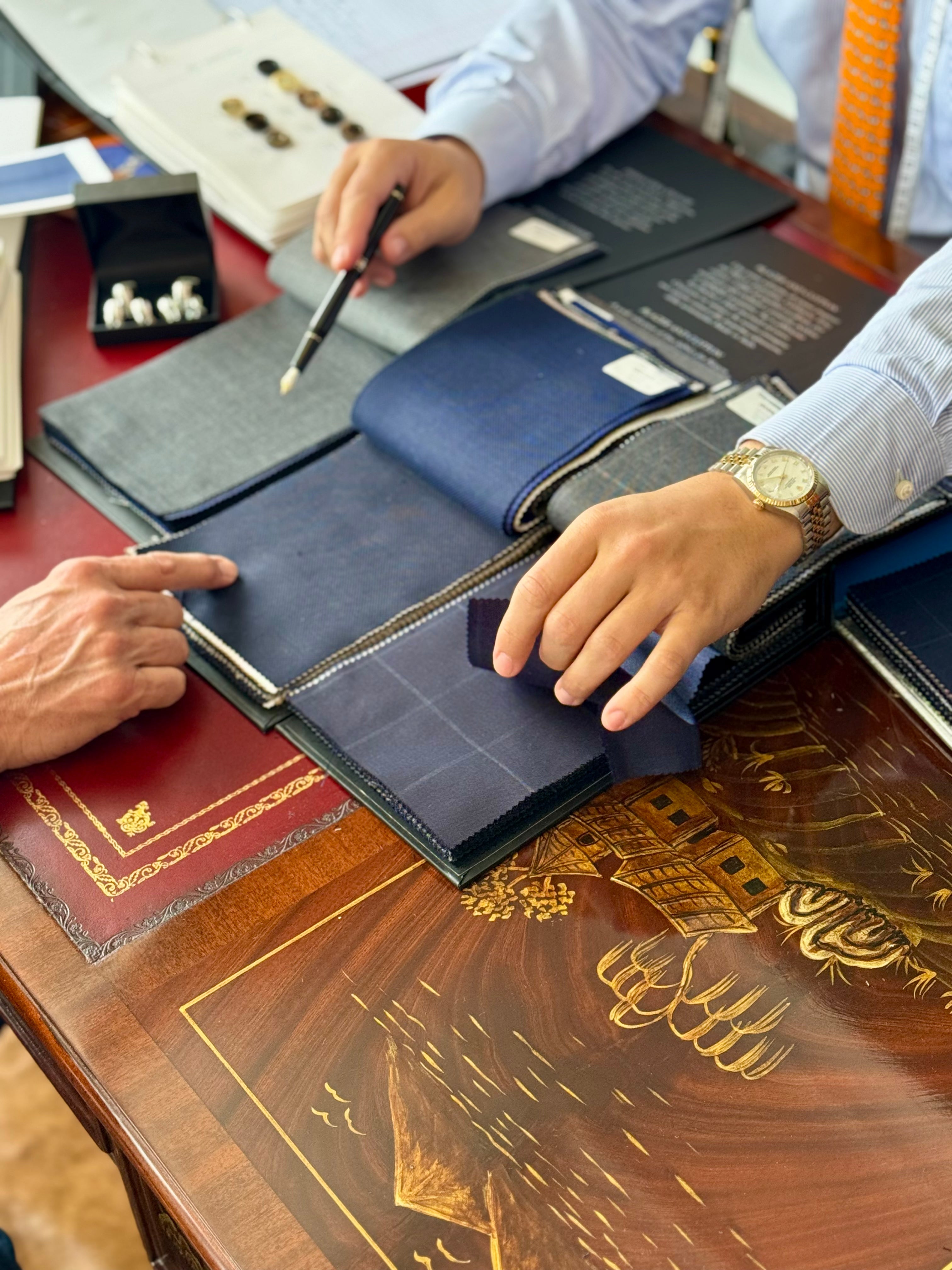 Fabric selection for custom clothing at Waring Tuxedos