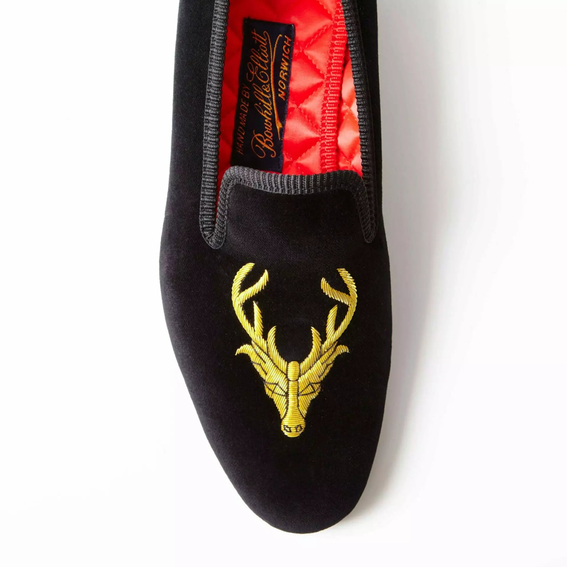 Bowhill and Elliott black velvet Albert slippers with stag at Waring Tuxedos in Fort Worth