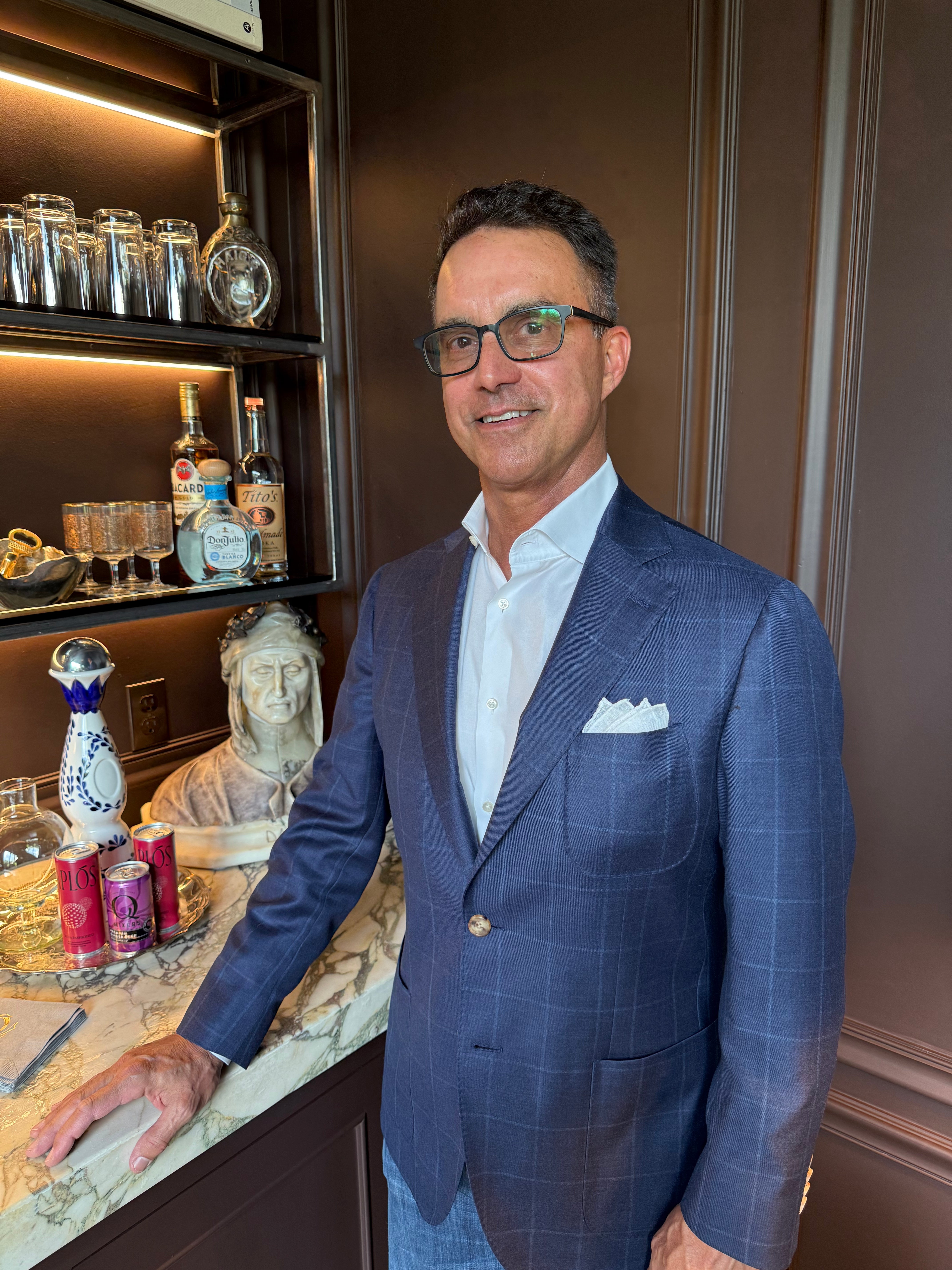 Patrick Waring wearing a custom blue windowpane sport coat from Waring Tuxedos in Fort Worth
