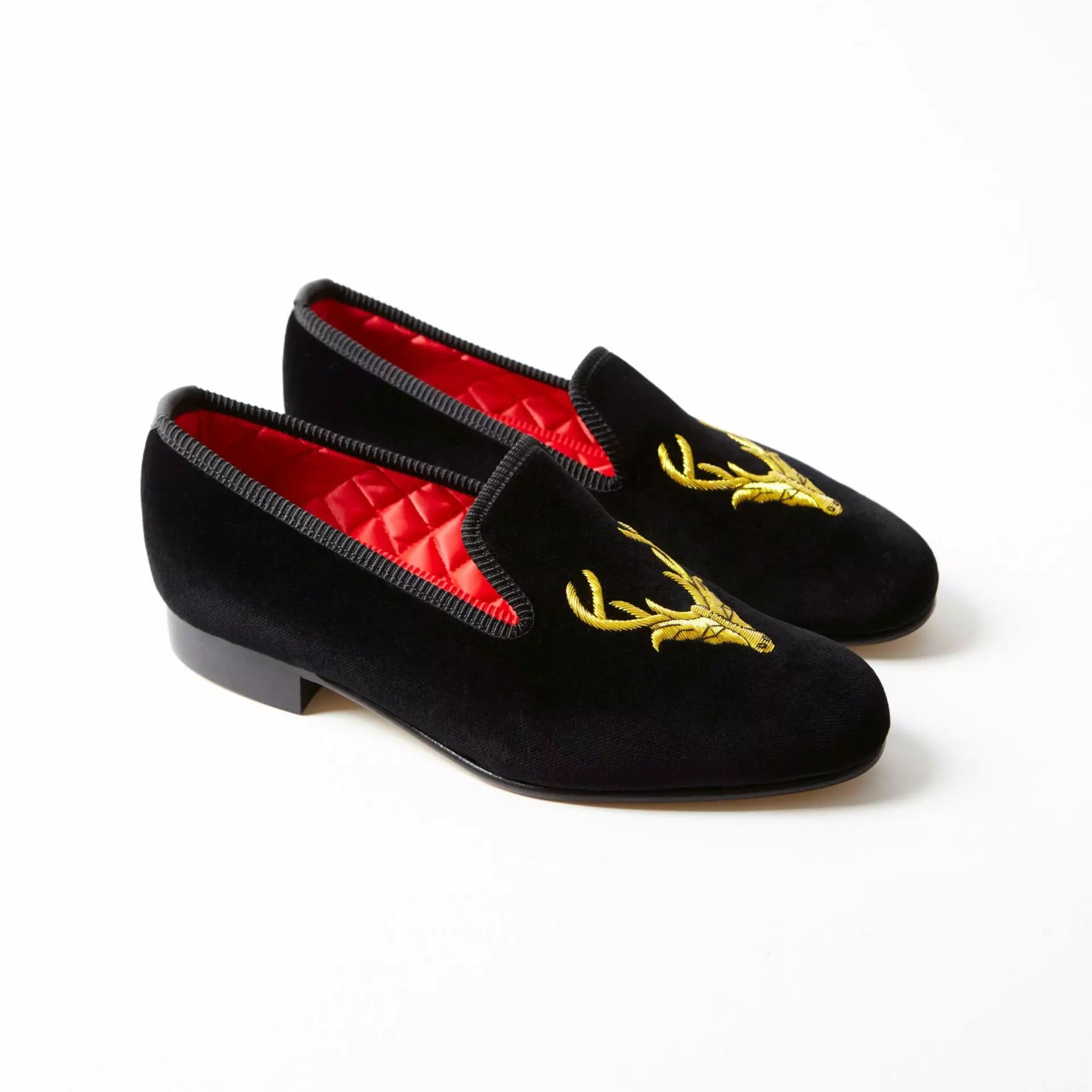 Bowhill and Elliott black velvet Albert slippers with stag at Waring Tuxedos in Fort Worth